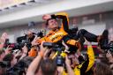 McLaren’s Lando Norris is lifted after winning the Miami Grand Prix (Rebecca Blackwell/AP)