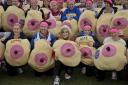 TV presenter Fearne Cotton (front centre) joins supporters of breast cancer charity CoppaFeel!, wearing giant boob costumes as they wait to take part in the Bath Half Marathon, where 100 supporters are taking part to raise money for the cancer charity