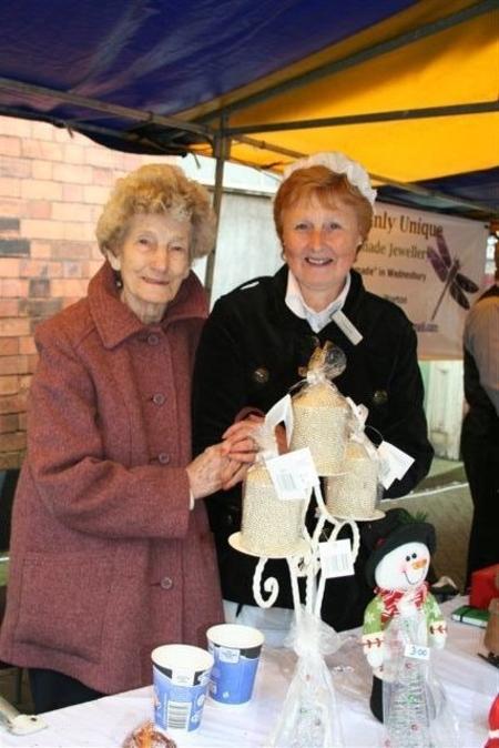 Lapal House care assistant Yvonne Hill and resident Ida Hardcastle show off home made crafts.