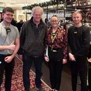 Sir Tim Martin, chairman of JD Wetherspoon, at The Chequers Inn in Stourbridge, pictured centre, with Dan Gardner, left, Charlotte Evans and Luke Brookes, right.