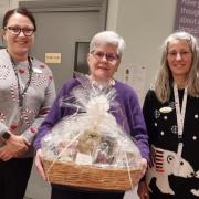 Hamper winner Amanda Davis (centre) with Specsavers supervisors Claire Dalrymple and Tracy Farrier