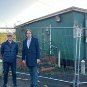 James Morris MP with David Chaffey, Chair of the Friends Group, outside the old visitor centre which they are hoping to see removed