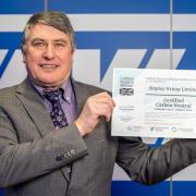 Mark Fulwell with the Carbon Neutral Britain certificate.