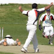 Evesham’s Shazhad Ayaz lies on the ground after being run out. Picture: JONATHAN HIPKISS.