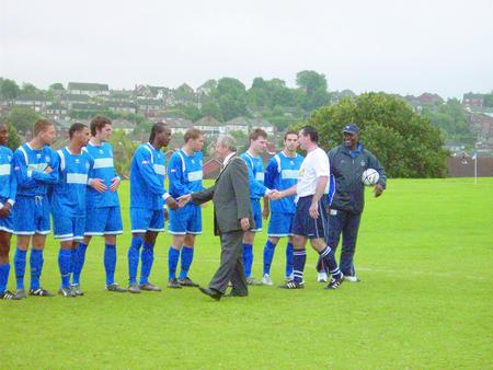 The mayor of Dudley cllr Ray Burston and Bob Taylor shake hands with Halesowen Town players.