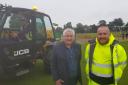 Councillor Patrick Harley, leader of Dudley Council, with Greg Prosser (inside JCB cab) and Liam Bryant from the authority’s highways team.