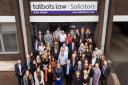 Staff at Talbots Law celebrate the company's Living Wage Employer status