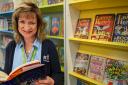 Dudley Library staff member, Sally Cartwright, pictured with The Book of Legends by Sir Lenny Henry. Pic - Dudley Library