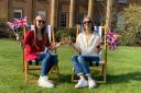 Heidi Thomas and Jessica Haines prepare to watch the live screening of the King's Coronation at Himley Hall and Park