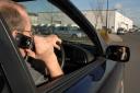 Fines for driving while using a mobile phone treble in West Midlands