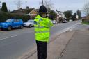 SLOW DOWN: An officer with a speed camera in Omberlsey.