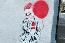 Reader Robert Bannks sent in snaps of the latest artwork depicting a boy clown holding a bright red balloon which has appeared at Shell Corner