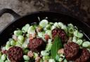 TASTY: Rick’s fresh broad beans with black sausage and garlic shoots.