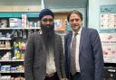 James Morris with Sanj Singh, Pharmacy Manager.
