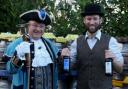AWARD WINNERS: Jim Davis, founder of Hobsons, celebrate the Old Henry and Town Crier bottles picking up gold and bronze medals at the CAMRA West Midlands Beer of the Year competition with Tim Sant.
