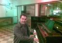 Sitting where Elvis played piano at Studio B in Nashville.