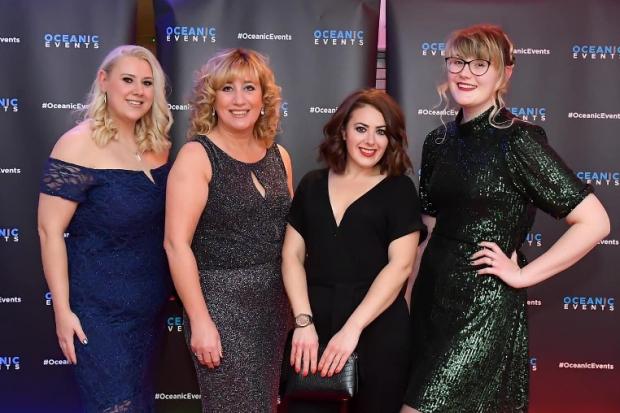 Pictured (left to right) Latasha Warr, salon owner and manager Amanda Dixon, Lizzie Marsden and Amanda's daughter Lauren Hadcroft picking up the award.
