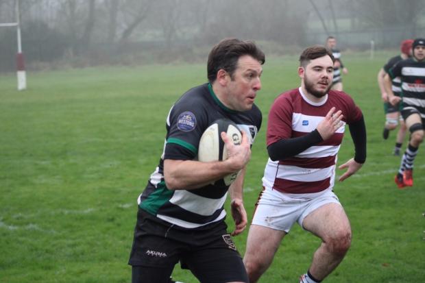 Adam Draper on the charge for Ledbury in their 92-0 win over Stoke Old Boys