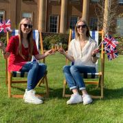 Heidi Thomas and Jessica Haines prepare to watch the live screening of the King's Coronation at Himley Hall and Park