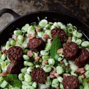 TASTY: Rick’s fresh broad beans with black sausage and garlic shoots.