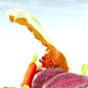 Roasted loin of Venison with creamed vegetables and chocolate