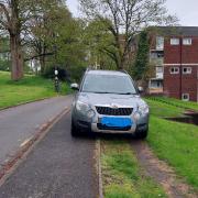 Police shared a picture of this car parked across the footpath