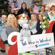 Christmas joy: Jo Gregory, Dan Murphy and Lauren Miles from Zion, Claire Cooper, Jayne Holliday and Jenny Smith from Thursfields, and Tanya Fellows from Acorns