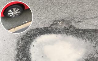 Mary Hadley's tyre with the large pot hole on Bell Vale