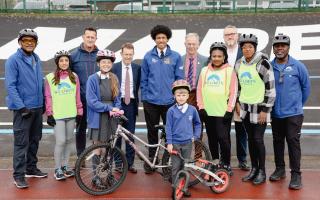 Dean Hill - Sport England, Mayor Andy Street, campaigner Dave Viner, Adam Tranter - cycling and walking commissioner, with cyclists Al Campbell, Harby Duggal, Street, Kristian Larigo, Tracy McLean, Chrystal Campbell, Sam Henry, Scarlett and Noah, front.