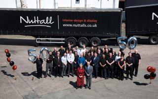 Alan Nuttall with staff with over 20 years' service