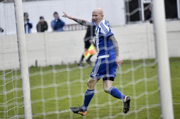 Lee Hughes celebrates scoring against Lye Town for Worcester City. Photo by David Griffiths.