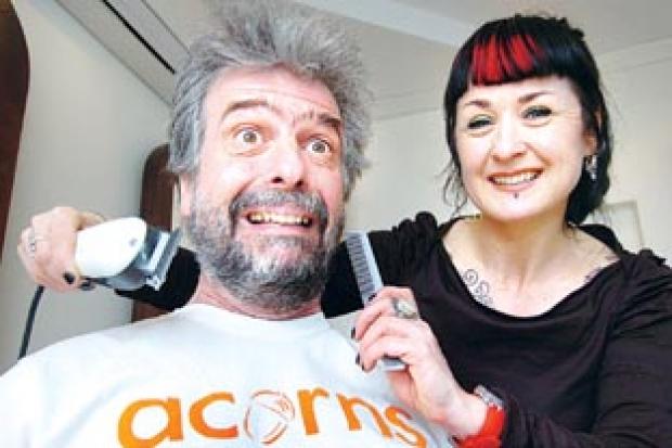 FUND-RAISING: Archaeologist James Dinn with his barber Pauline Luckman. Picture by John Anyon. (12175601)